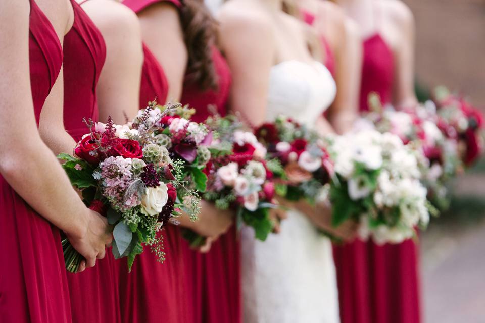 Bridesmaid flowers red dresses