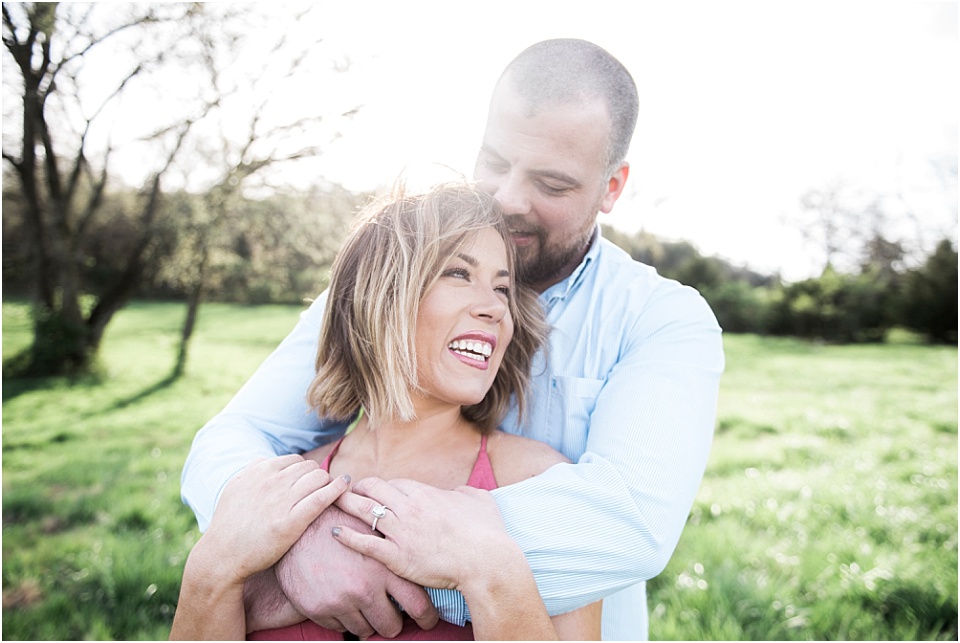 Couple laughing engagement session outdoors Nashville 