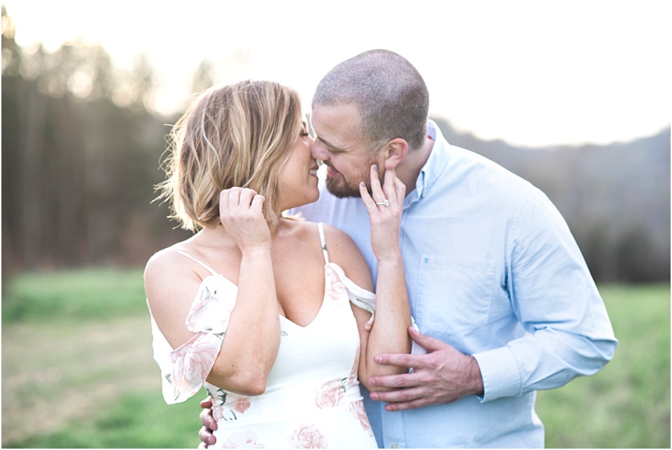 Engagement session couple kissing outdoors white dress Nashville TN