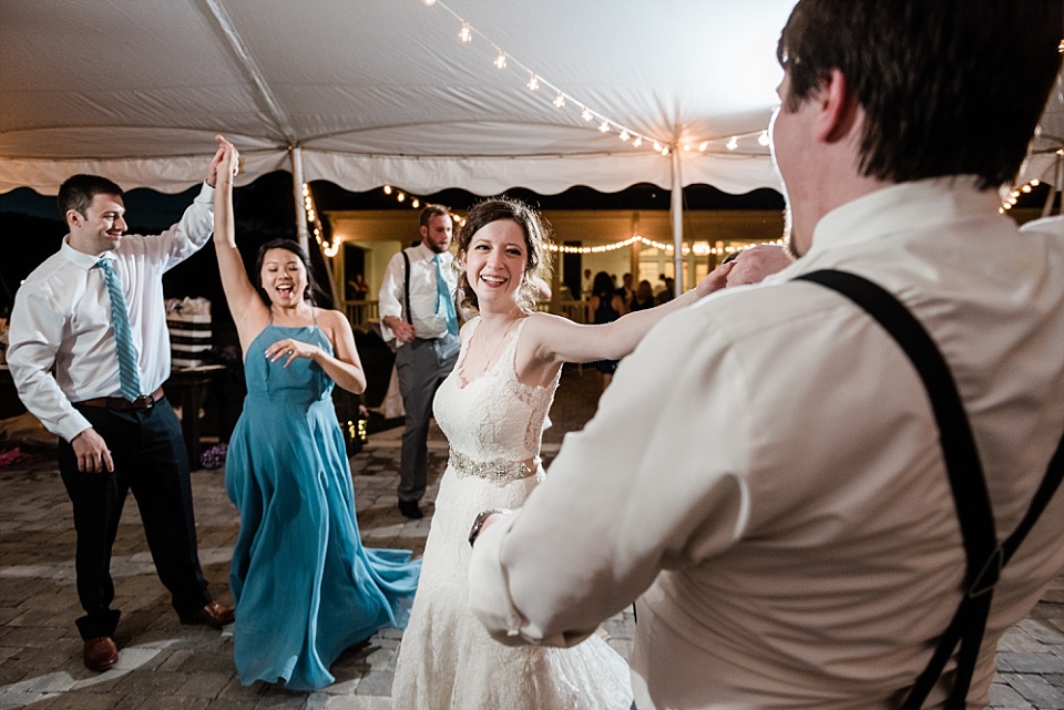 Wedding reception dancing under tent Ravenswood Mansion