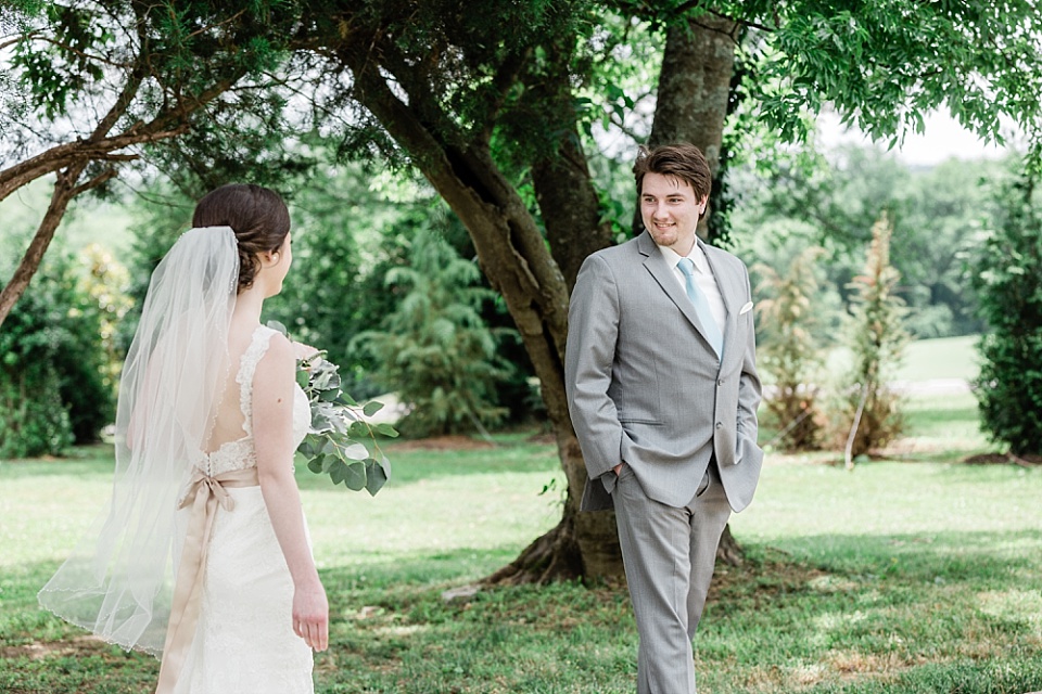 Bride and groom first look Ravenswood Mansion wedding