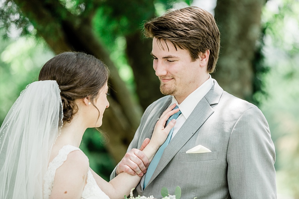 Bride and groom first look Ravenswood Mansion wedding