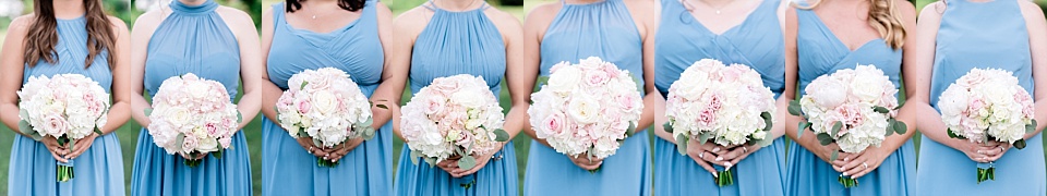 Bridesmaids blue dresses and white flowers