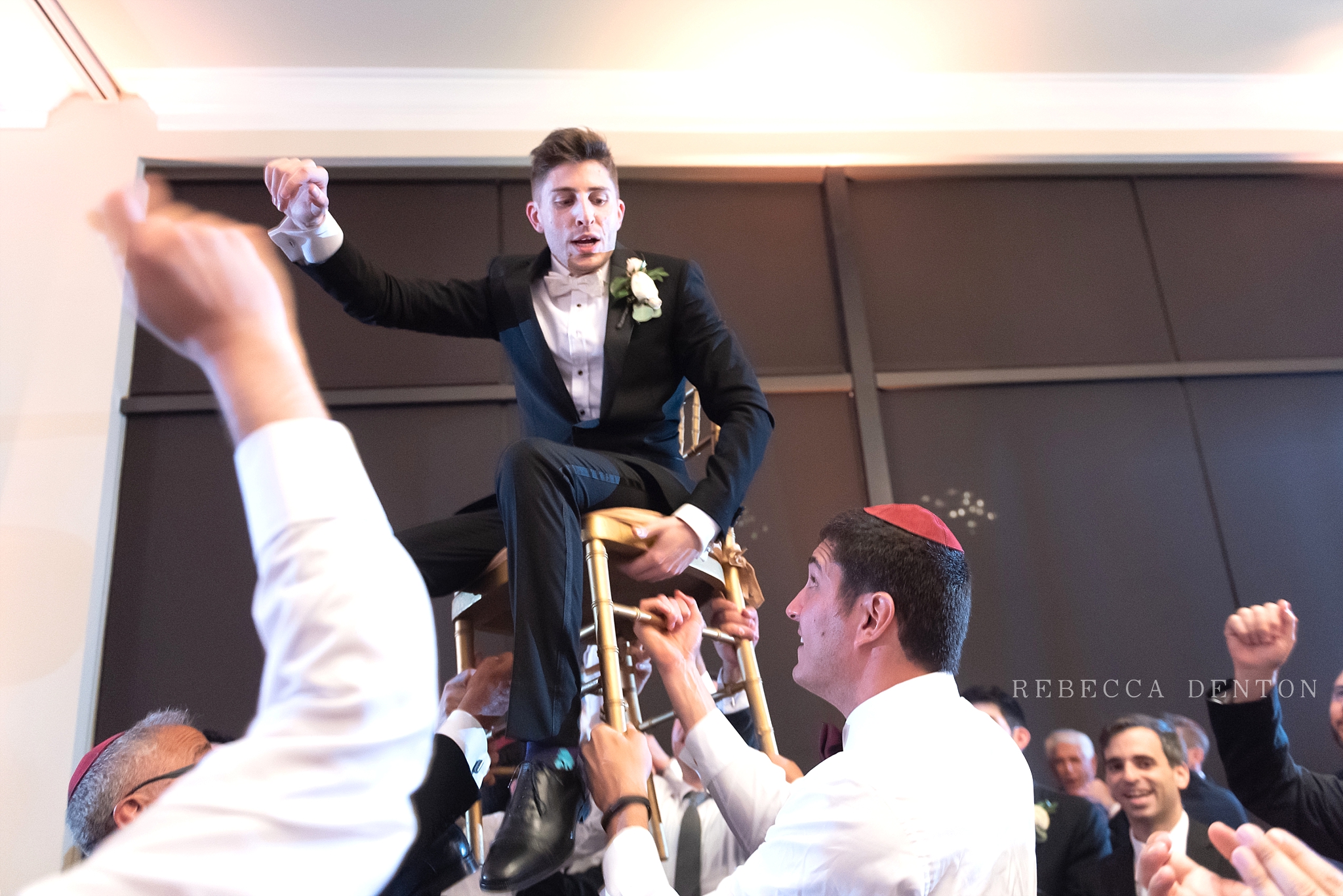 groom hora chair dance Jewish wedding