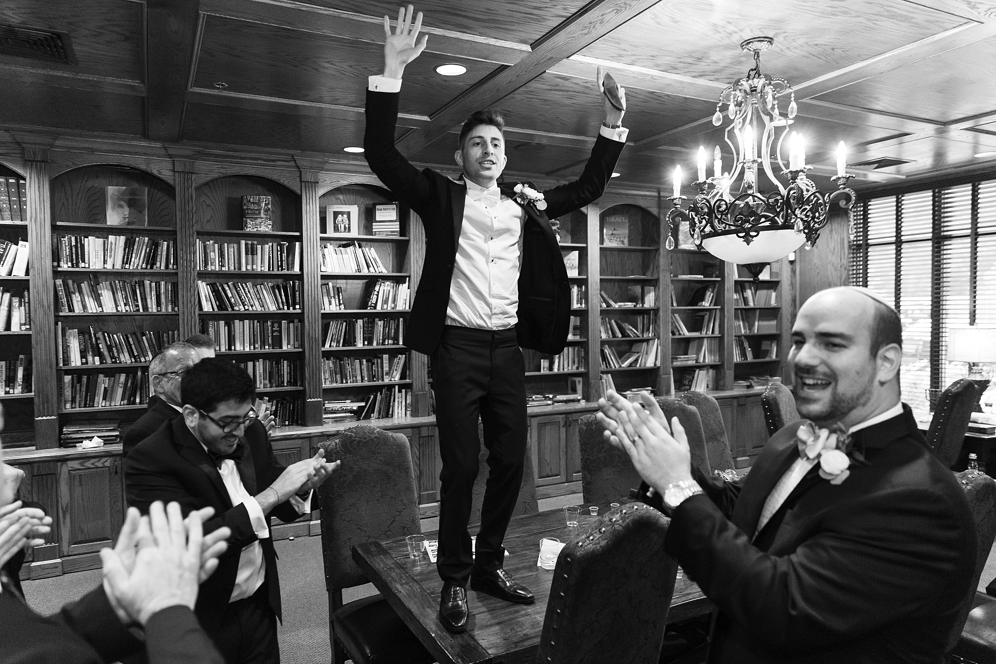 Groom dancing on table Jewish Wedding Chabad of Nashville