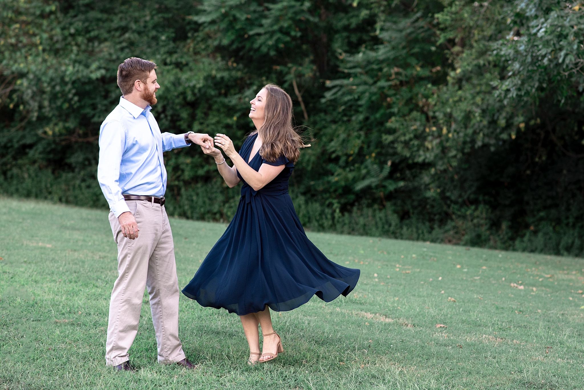 Engaged couple dancing at Percy Warner Park Nashville