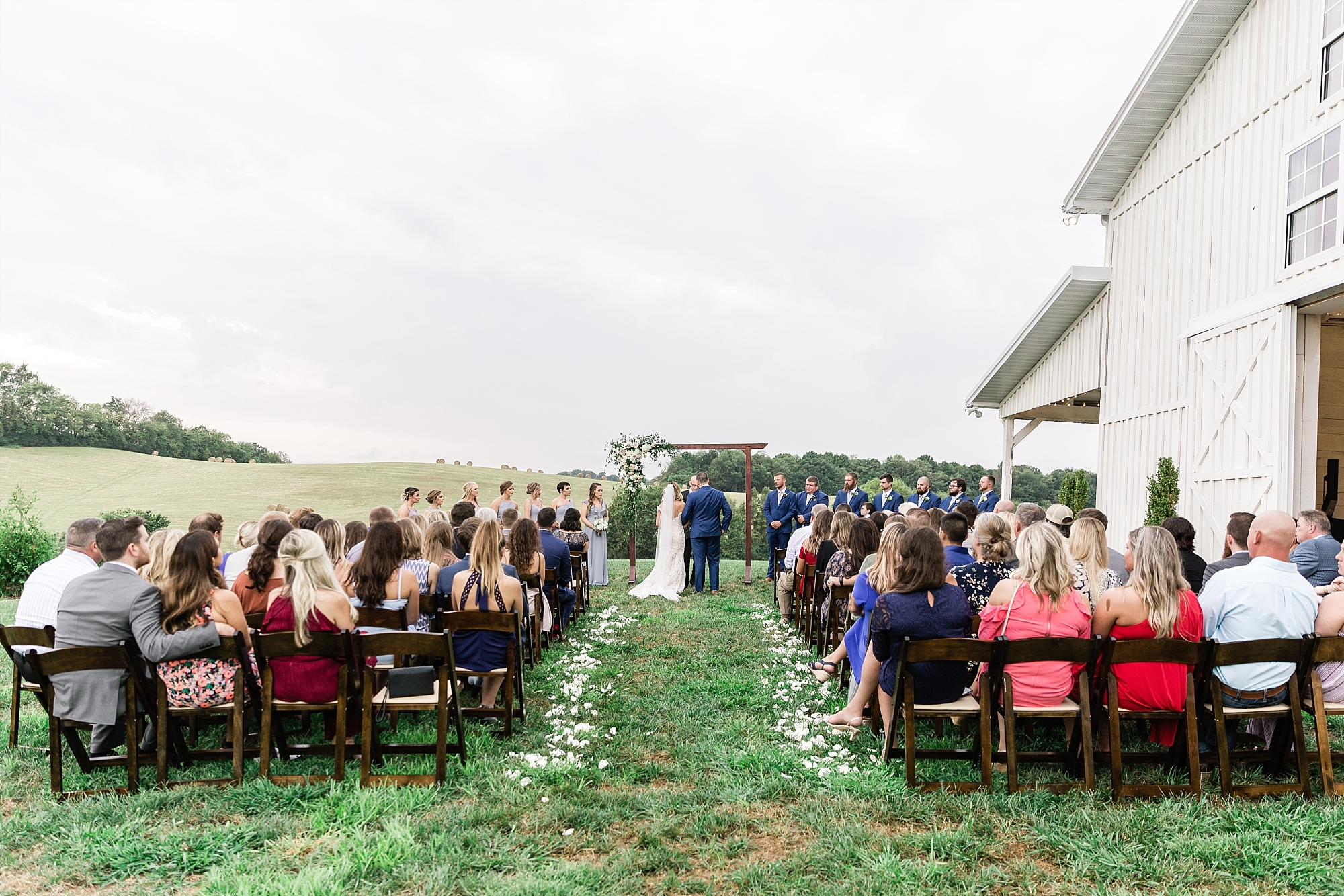 outdoor wedding ceremony White Dove Barn 