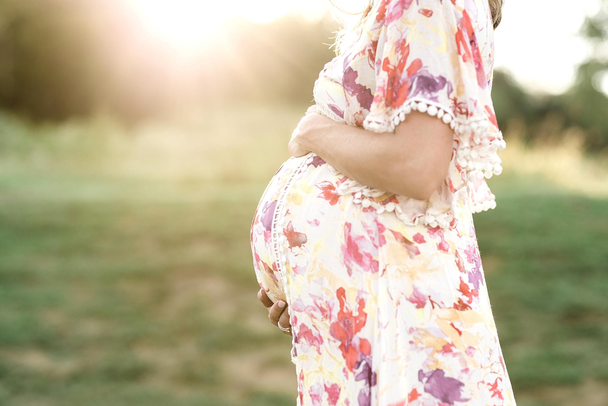 flowered dress Nashville maternity session sunlight