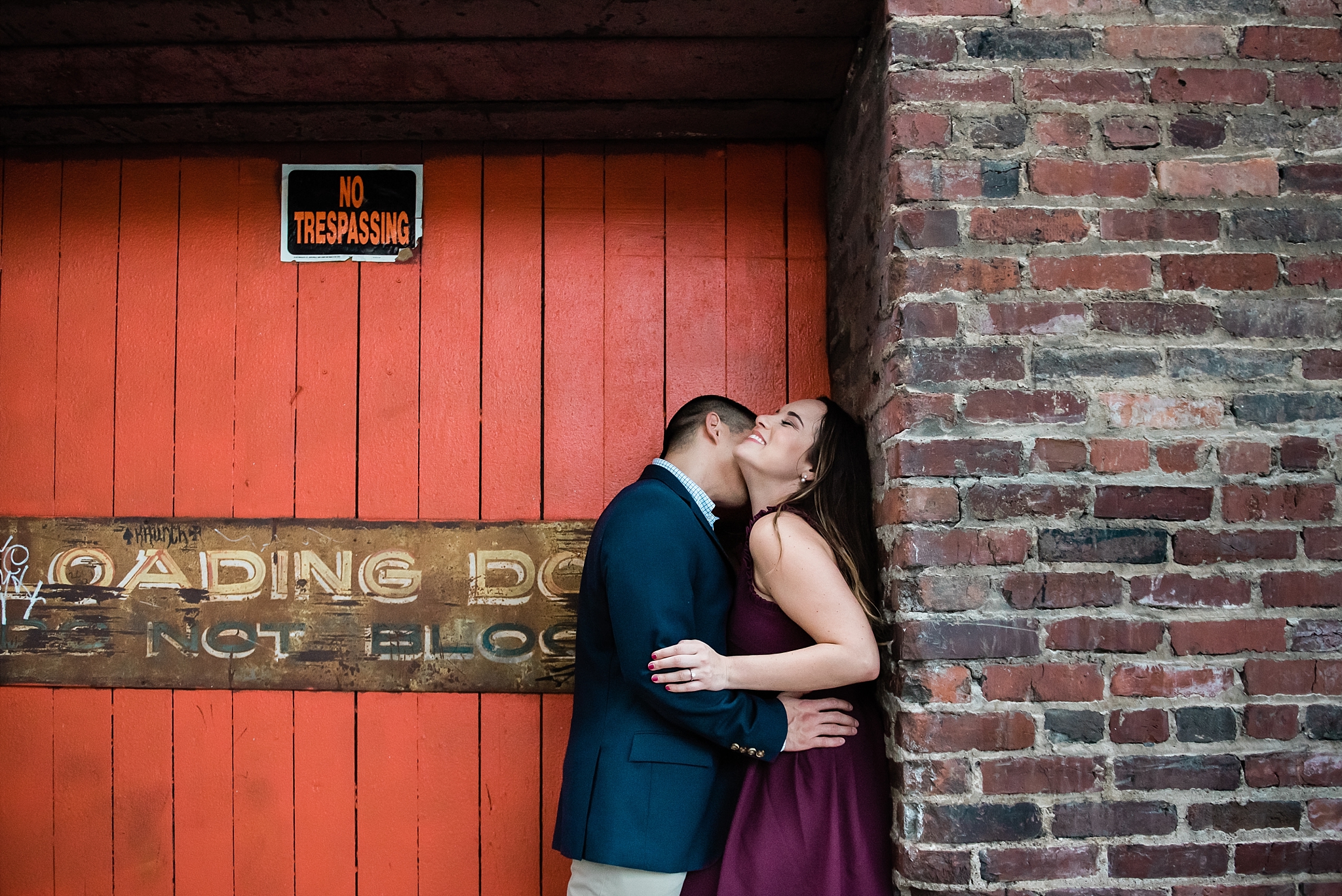 Couple kissing engagement session downtown Nashville