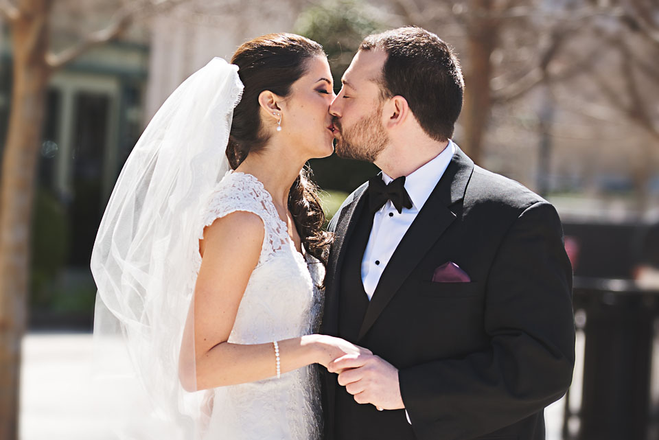 Bride and groom first look kiss