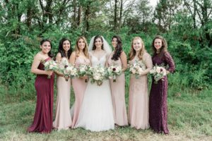Bride and bridesmaids pink and burgundy dresses
