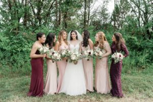 Bride and bridesmaids pink and burgundy dresses