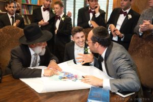 Ketubah signing groom Jewish wedding ceremony