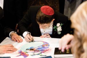 Ketubah signing groom Jewish wedding ceremony