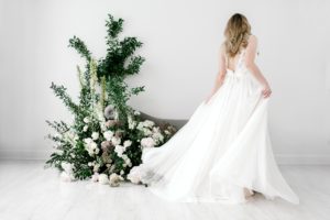 White roses and greenery floral installation Wildflowers LLC Nashville