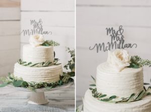 white wedding cake with greenery White Dove Barn