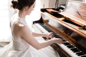 light airy bridal portrait with piano